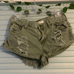 Green cut off shorts